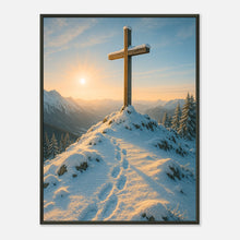 Light Over the Peaks Poster im schwarzen Metallrahmen – Kreuz auf schneebedecktem Berggipfel bei Sonnenaufgang, spirituelles Alpen-Wandbild von Defa Designs.