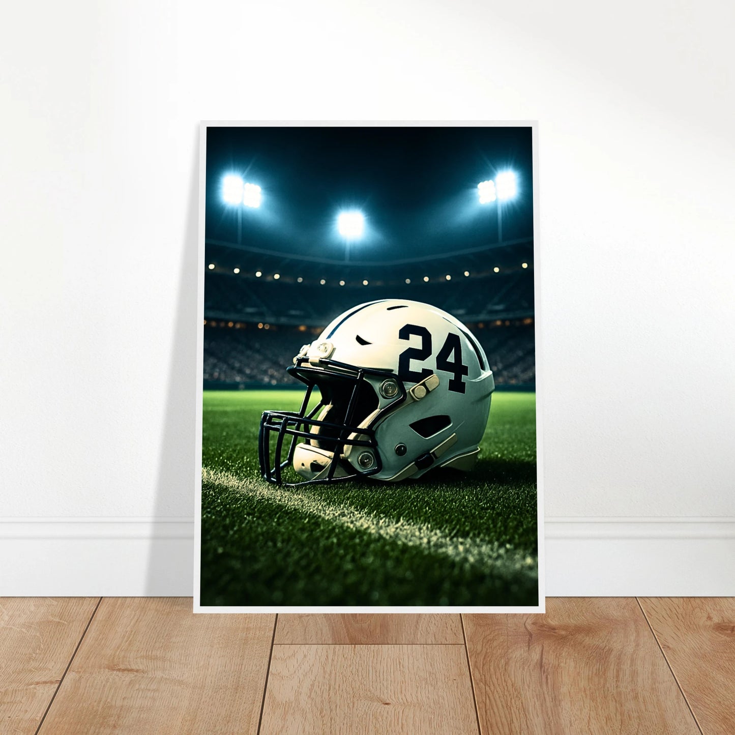 Ungerahmtes „Under the Lights“ Poster an die Wand gelehnt – minimalistisches Football Wandbild mit Stadion-Lichtszene.