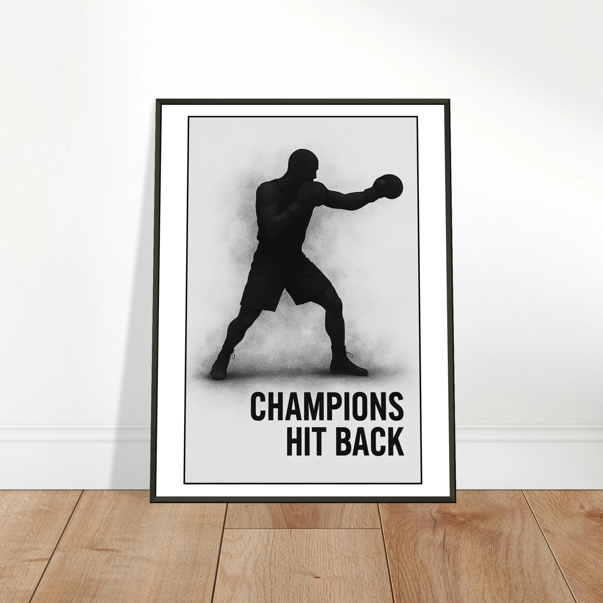 Boxing Poster „Champions Hit Back“ an die Wand gelehnt – elegantes Motiv für Homegym und Sport-Studio | DEFA Designs