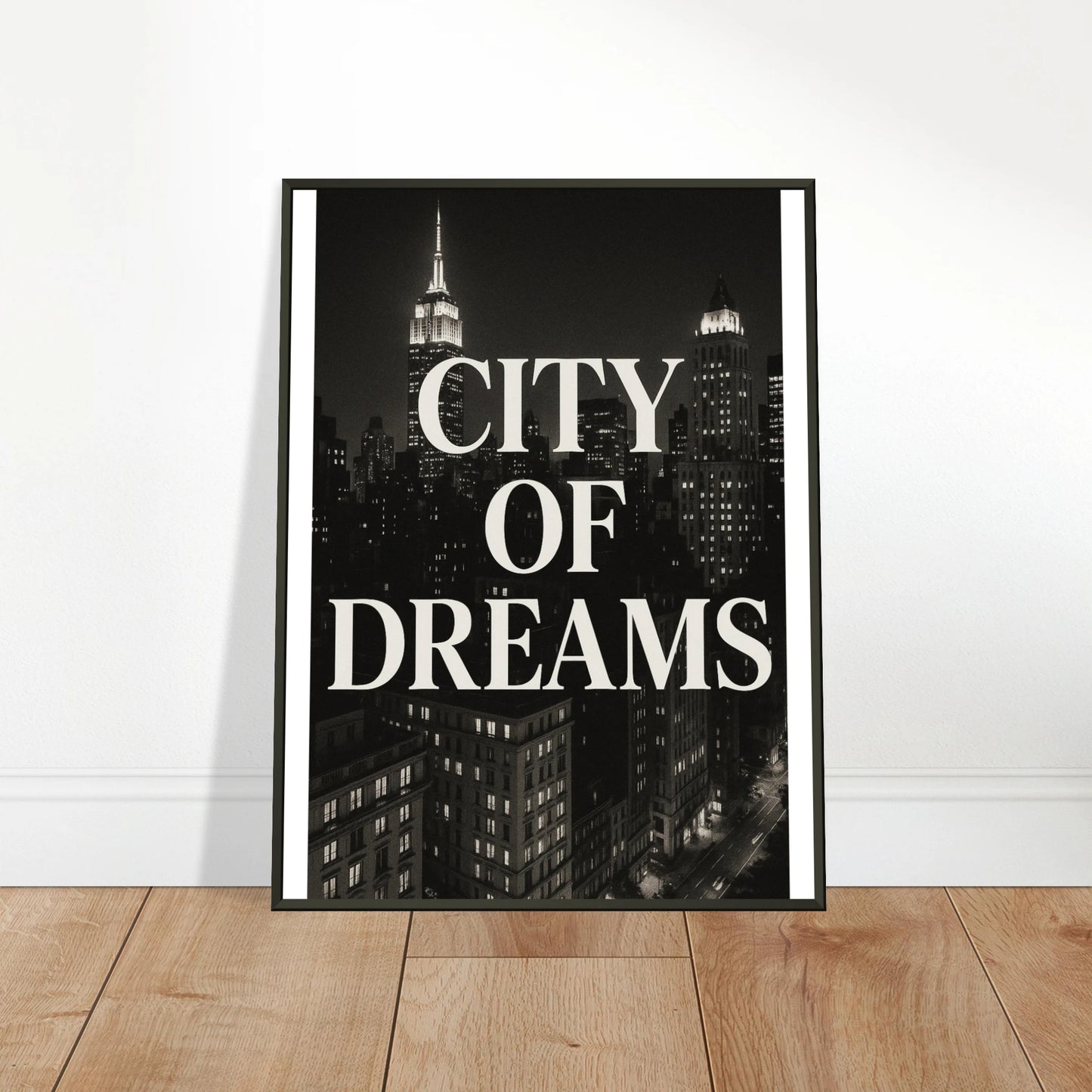 City of Dreams NYC wall art poster leaning on floor in black metal frame
