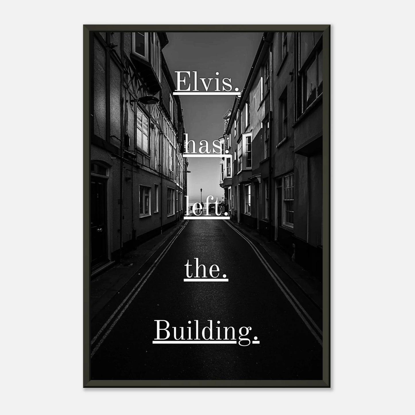 Elvis Has Left the Building wall art poster in black metal frame front view with monochrome street scene and typography