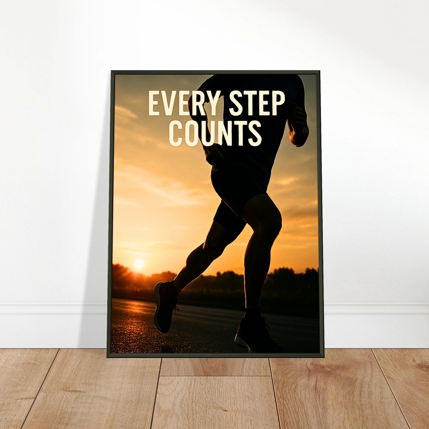 „Every Step Counts“ Poster an die Wand gelehnt – Lauf-Motiv im eleganten schwarzen Rahmen | DEFA Designs