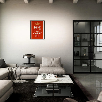 Keep Calm and Carry On poster in black metal frame styled in dark modern living room setting