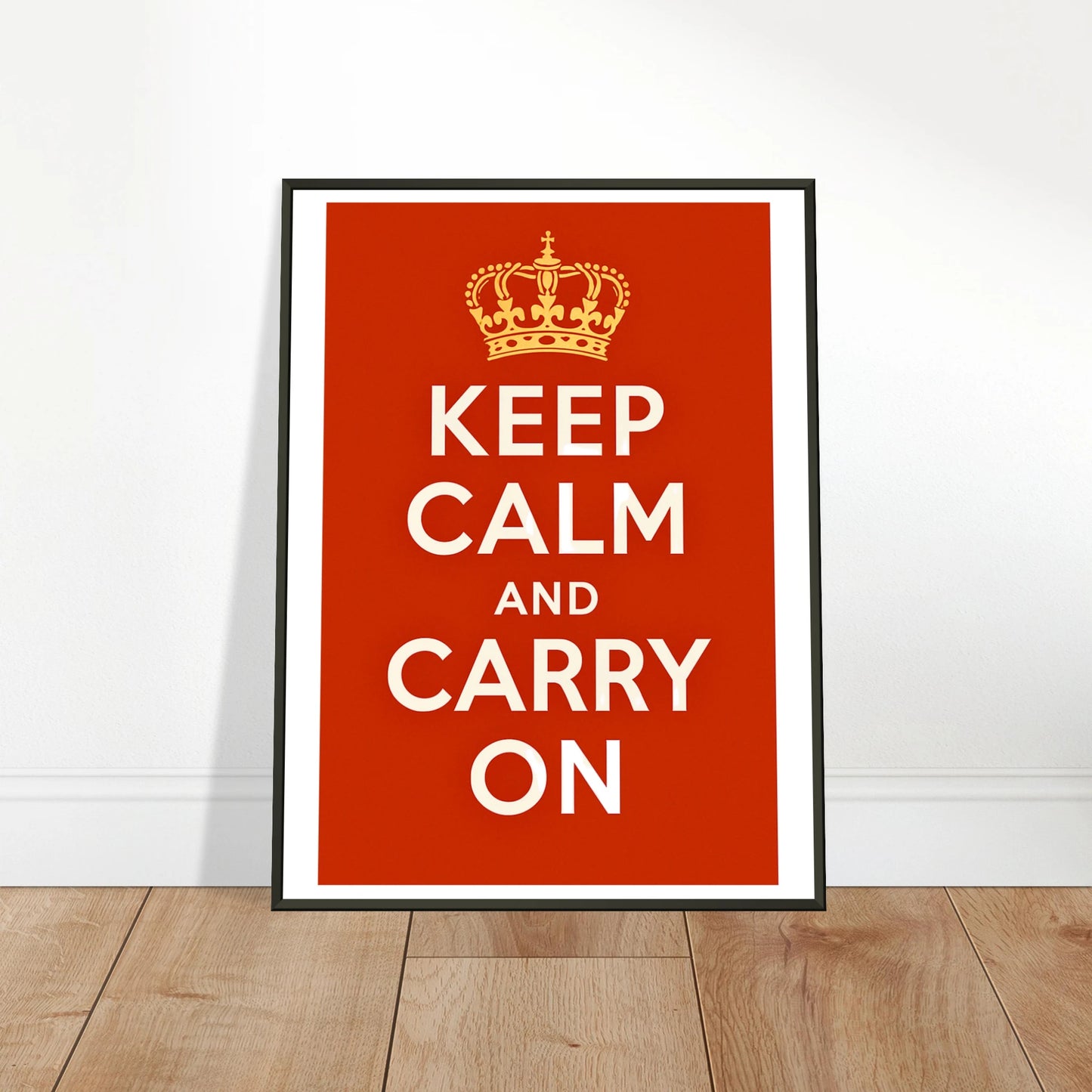 Keep Calm and Carry On wall art poster leaning against wall in black metal frame modern home decor mockup