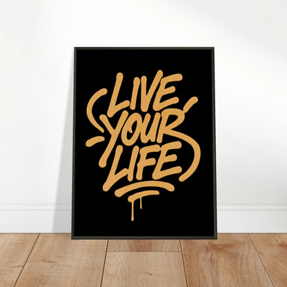 Live Your Life gold wall art poster leaning against wall in black metal frame modern creative interior mockup