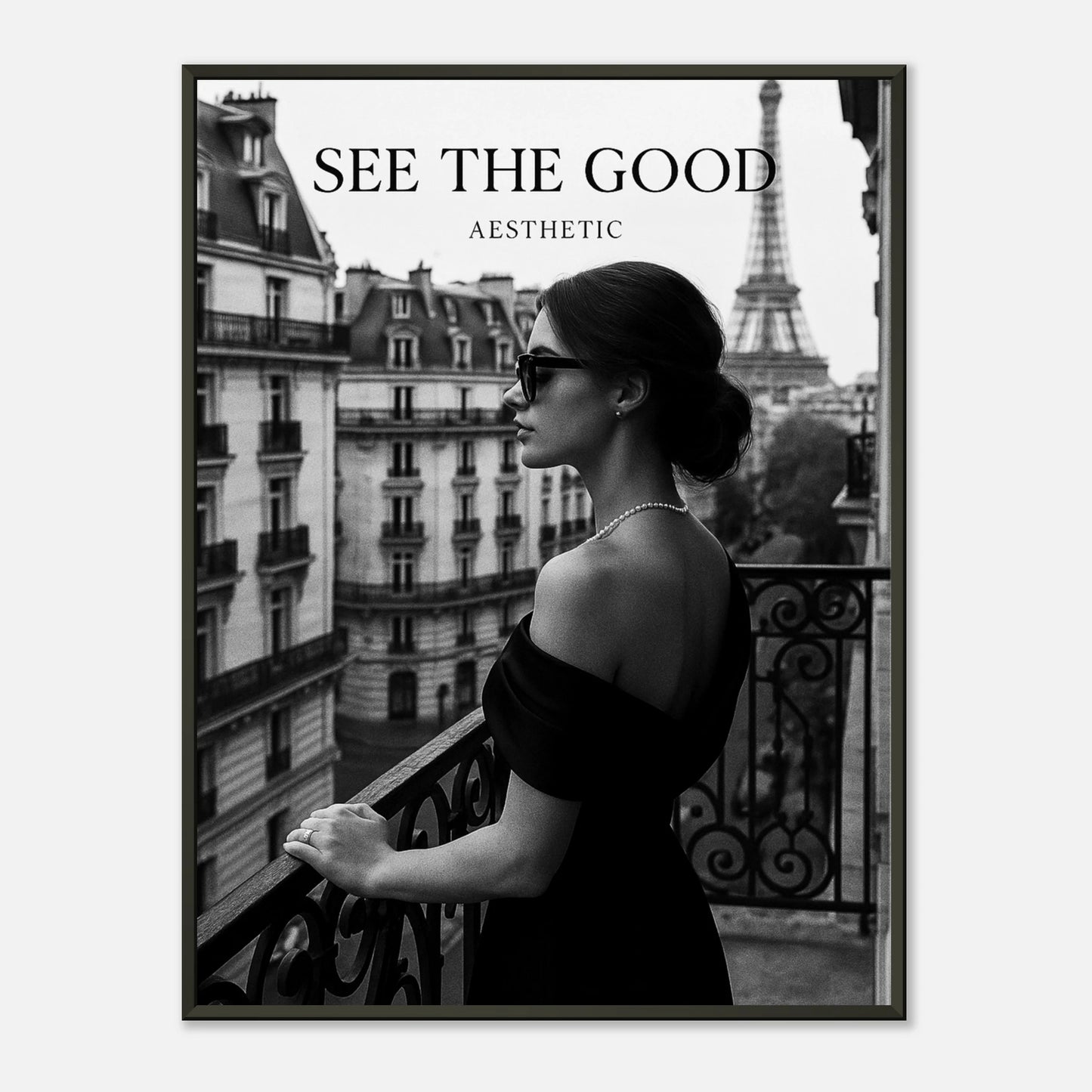 Black and white Paris wall art poster “See The Good” in black metal frame, elegant woman on balcony overlooking Eiffel Tower, modern minimalist home decor