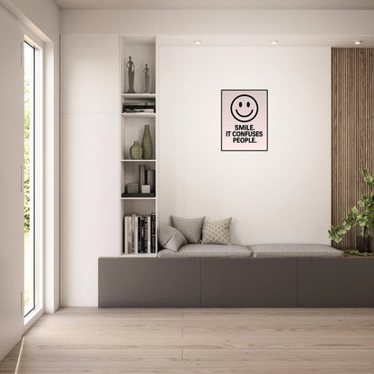 Smile Blush Pink smiley wall art in black metal frame displayed in bright modern living room interior