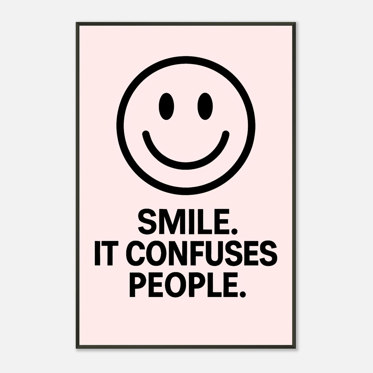 Smile Blush Pink typography wall art print in black metal frame with blush pink background and smiley graphic