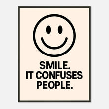 Smile Cream wall art poster in black metal frame featuring minimalist smiley face and bold typography quote design