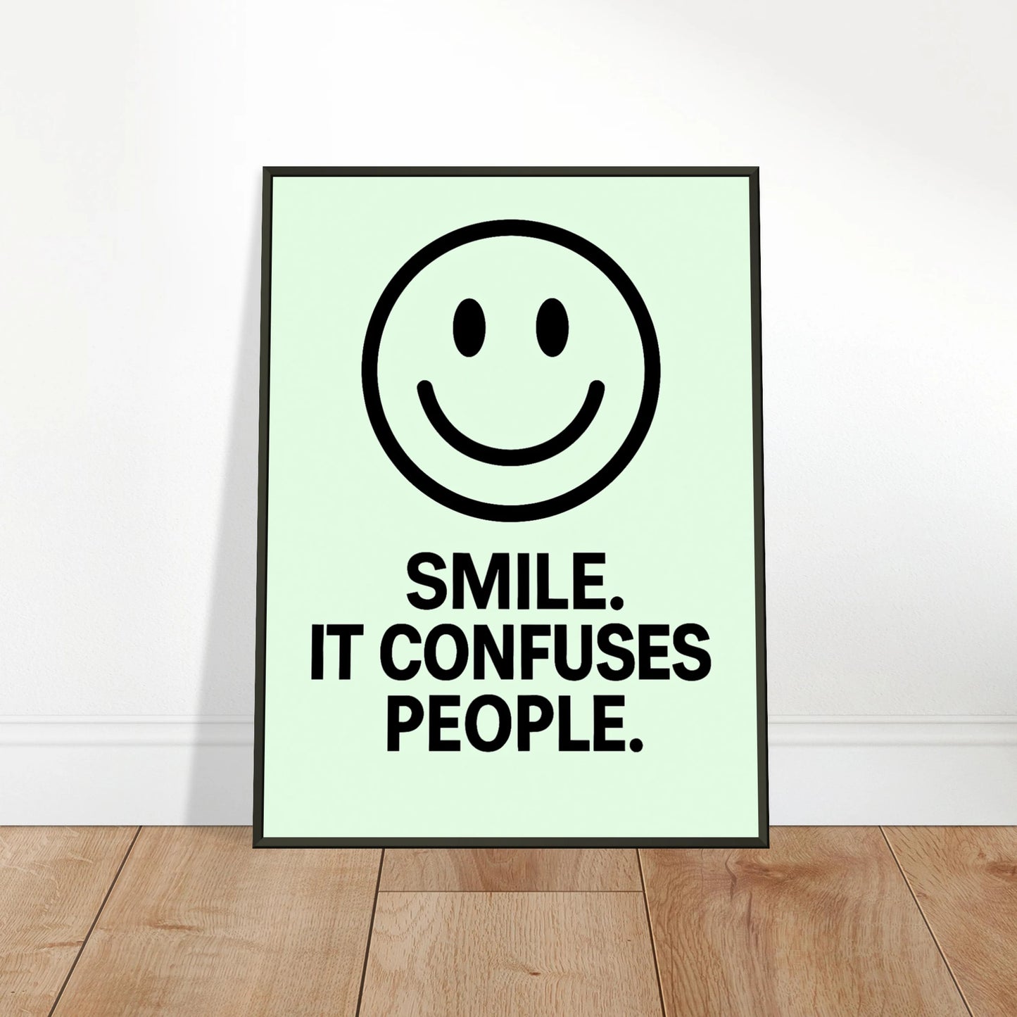 Smile Fresh Mint wall art poster leaning against wall in black metal frame modern hallway decor mockup