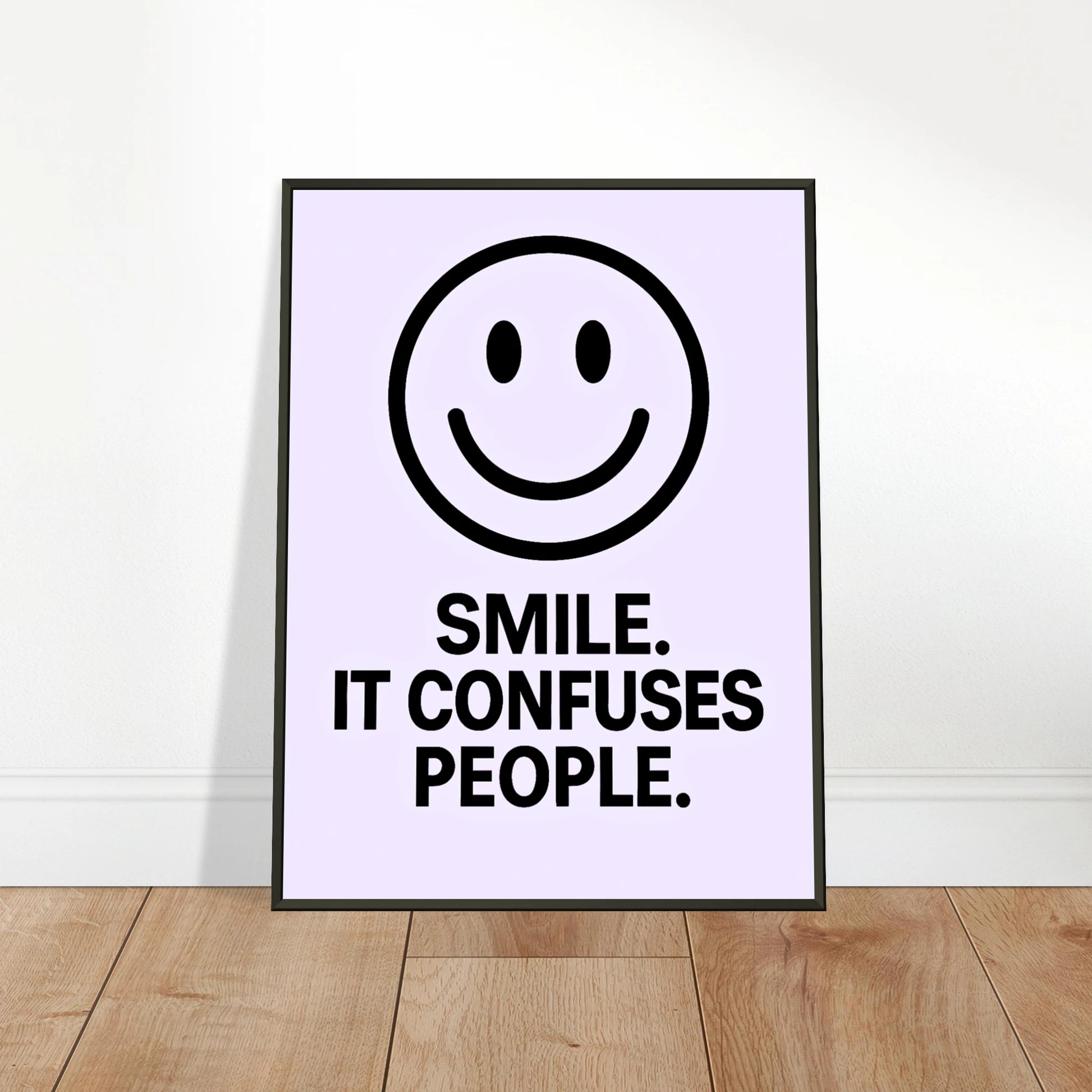 Smile motivational wall art poster leaning against wall in black metal frame modern hallway decor mockup