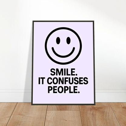 Smile motivational wall art poster leaning against wall in black metal frame modern hallway decor mockup