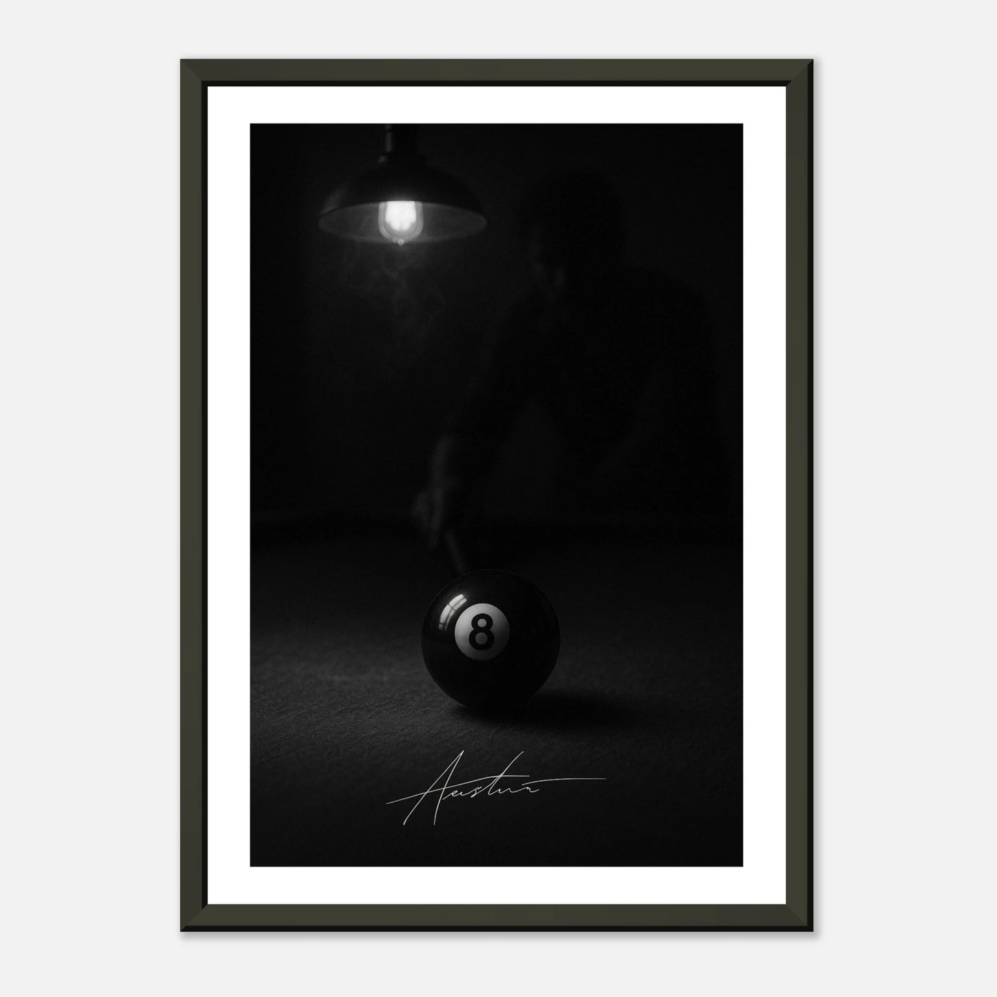 The Final Shot black and white billiard wall art print in black metal frame with focused 8 ball composition
