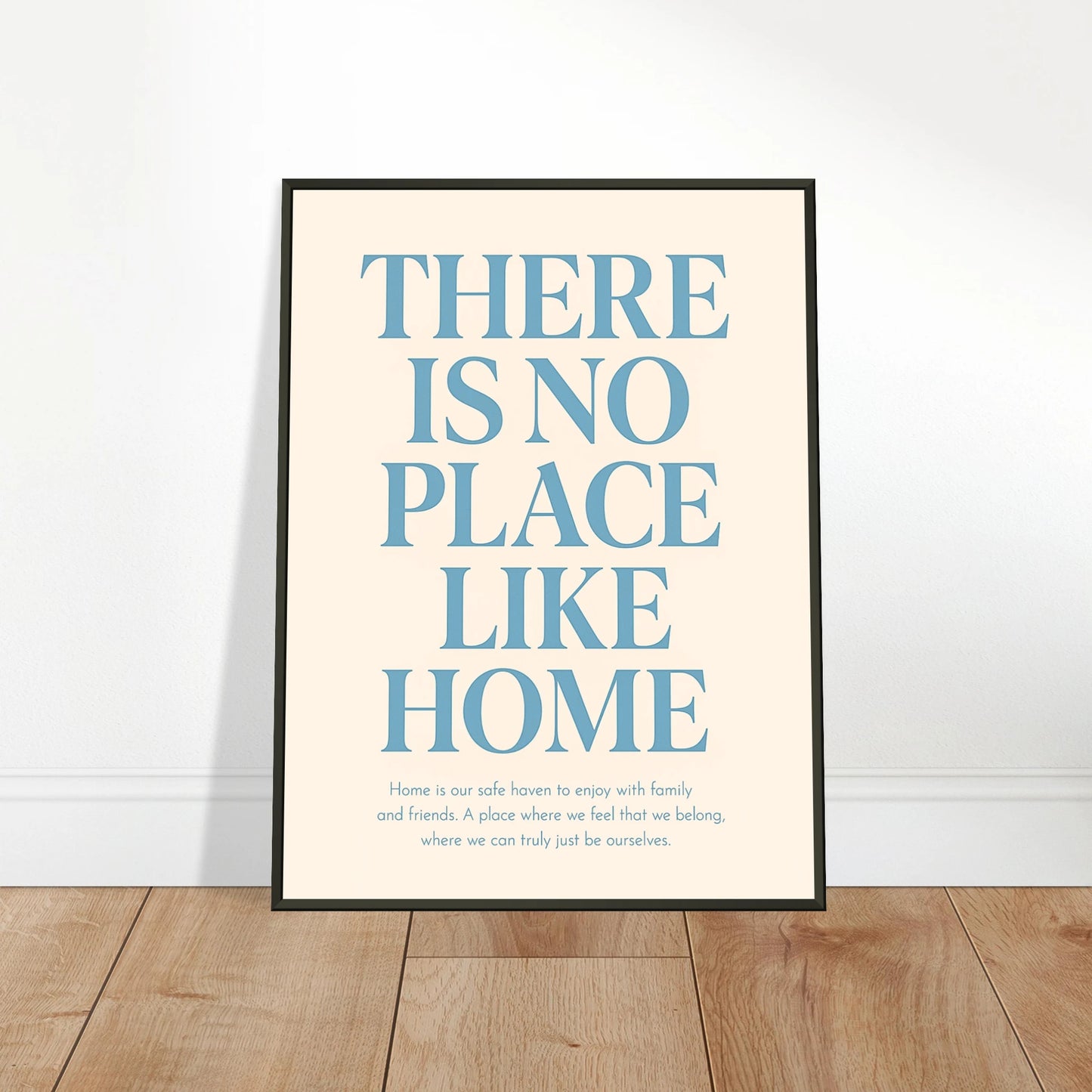 There Is No Place Like Home wall art poster leaning against wall in black metal frame cozy interior decor mockup