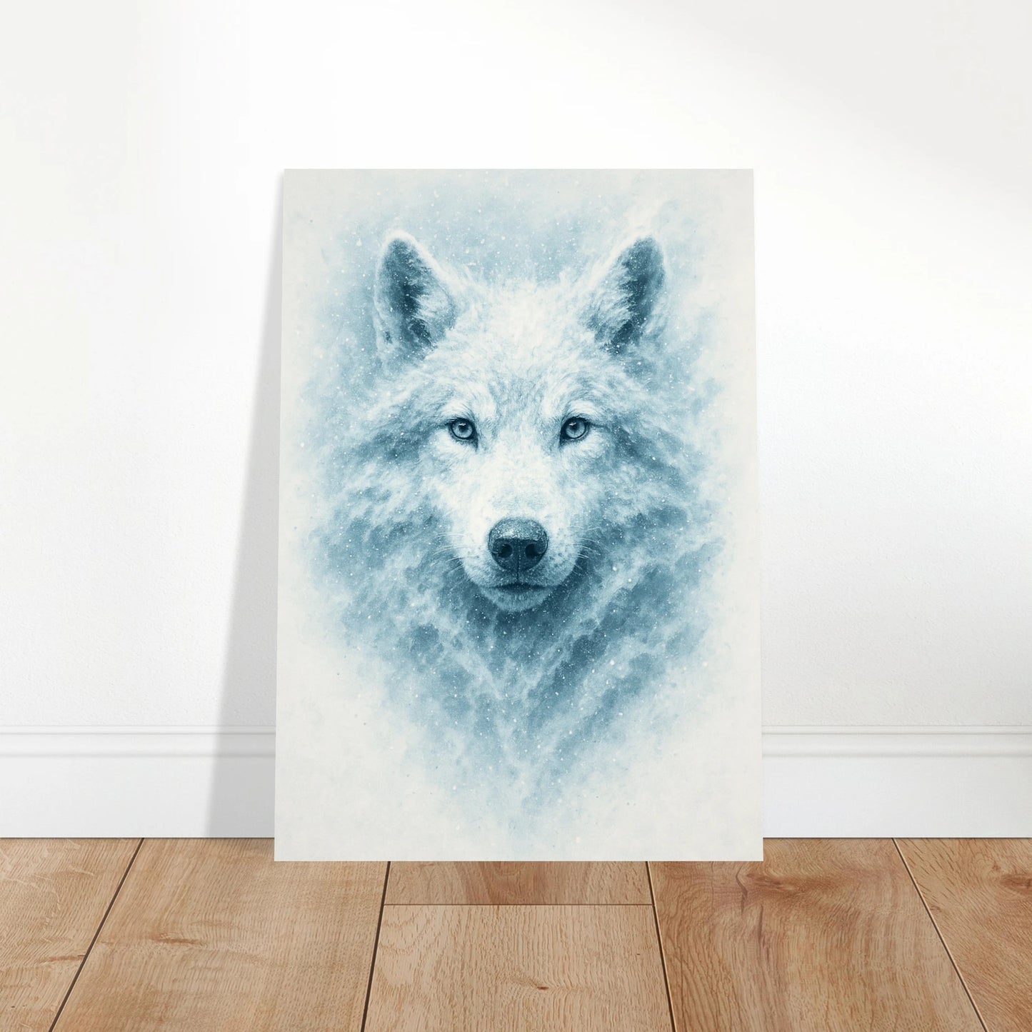 Unframed White Alpha Wolf Poster standing on wooden floor – nature art print, snowy wolf design.